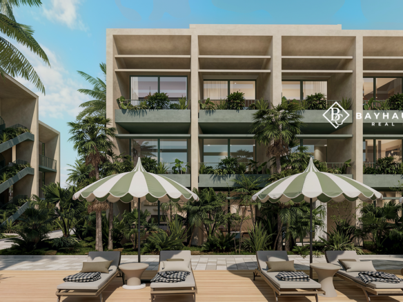 Washington Gardens Aruba luxury apartment development with tropical pool and landscaped gardens