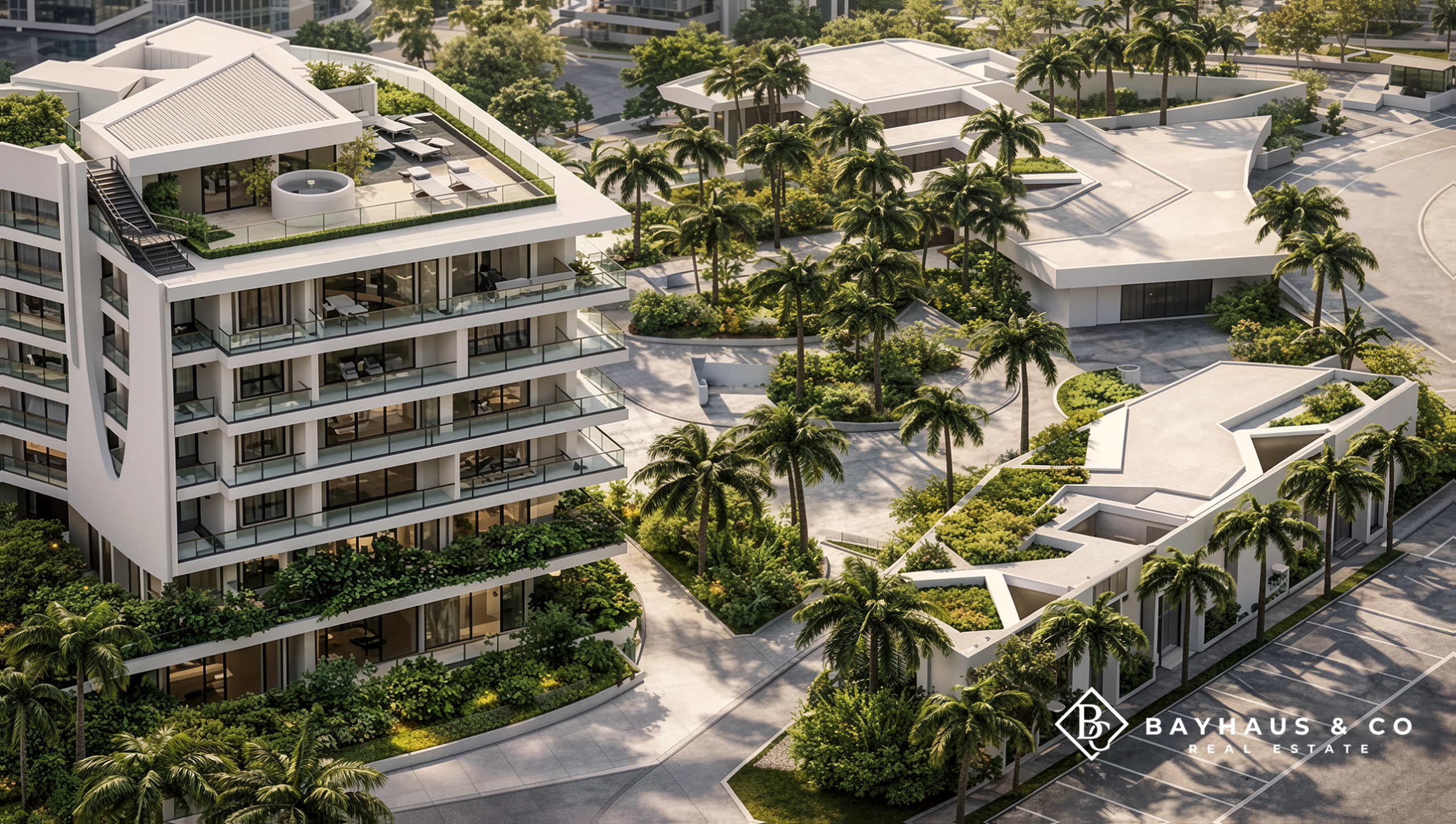 Aerial view of L’Aquila residences with tropical landscaping in Aruba