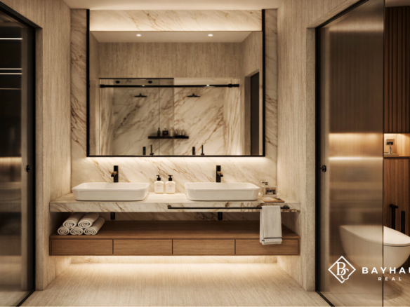 Luxury bathroom with double vanity and marble finishes at L’Aquila Aruba