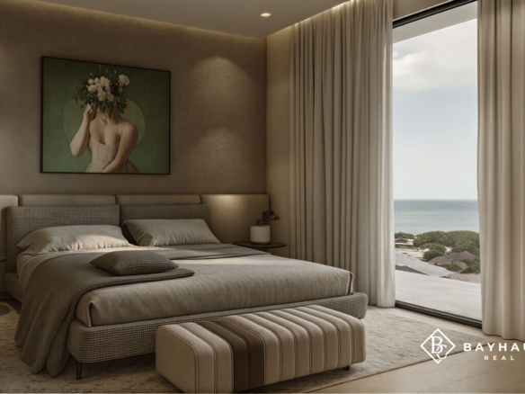 Luxury bedroom with floor-to-ceiling ocean view at L’Aquila Aruba