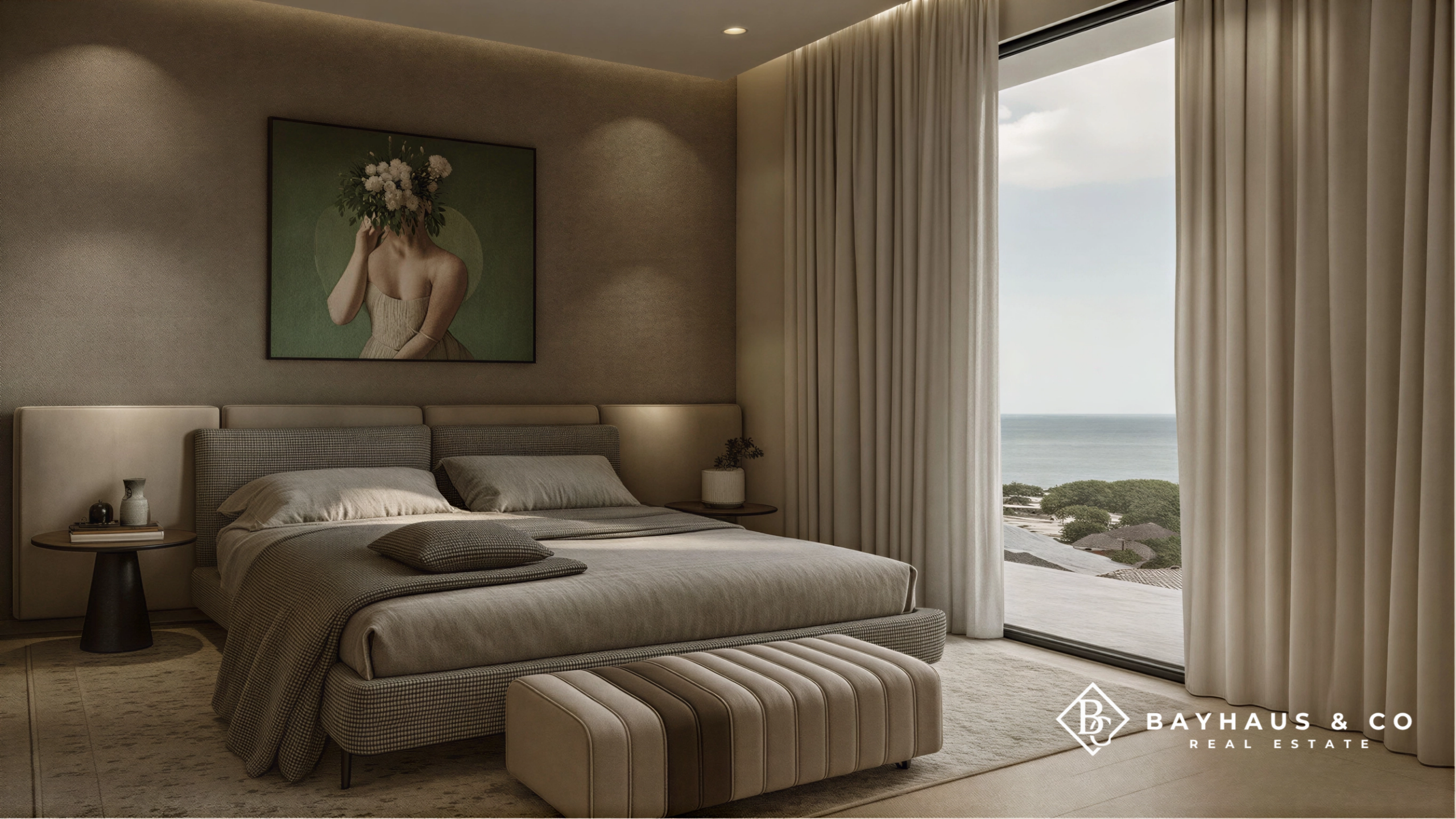 Luxury bedroom with floor-to-ceiling ocean view at L’Aquila Aruba