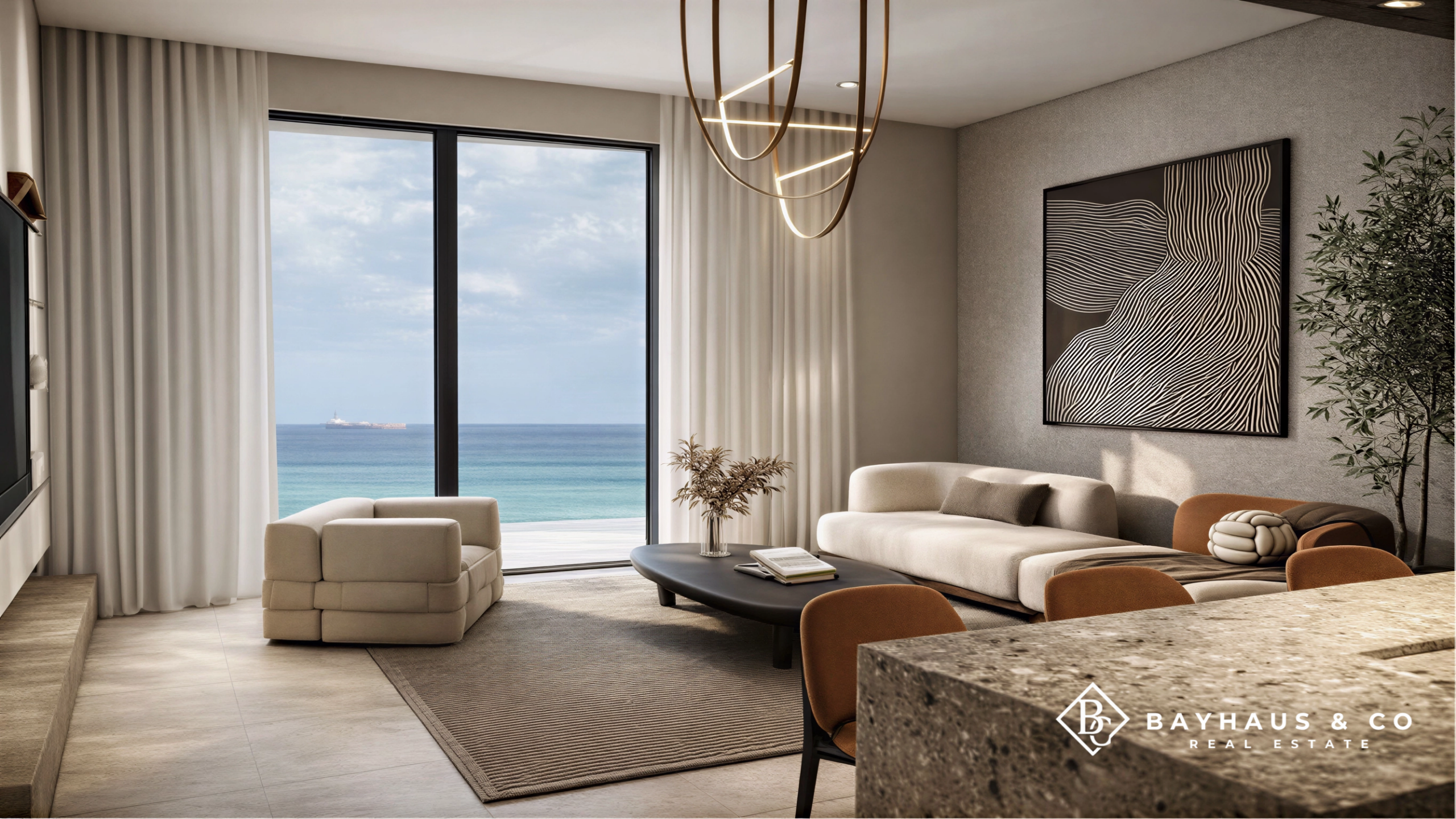 Luxury living room with Caribbean Sea view at L’Aquila Aruba