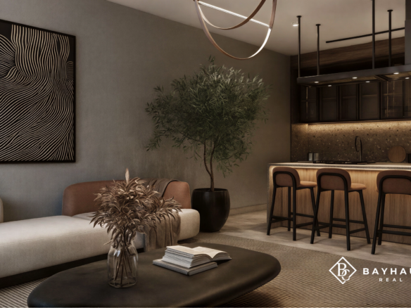Open-plan luxury living room and kitchen at L’Aquila Aruba